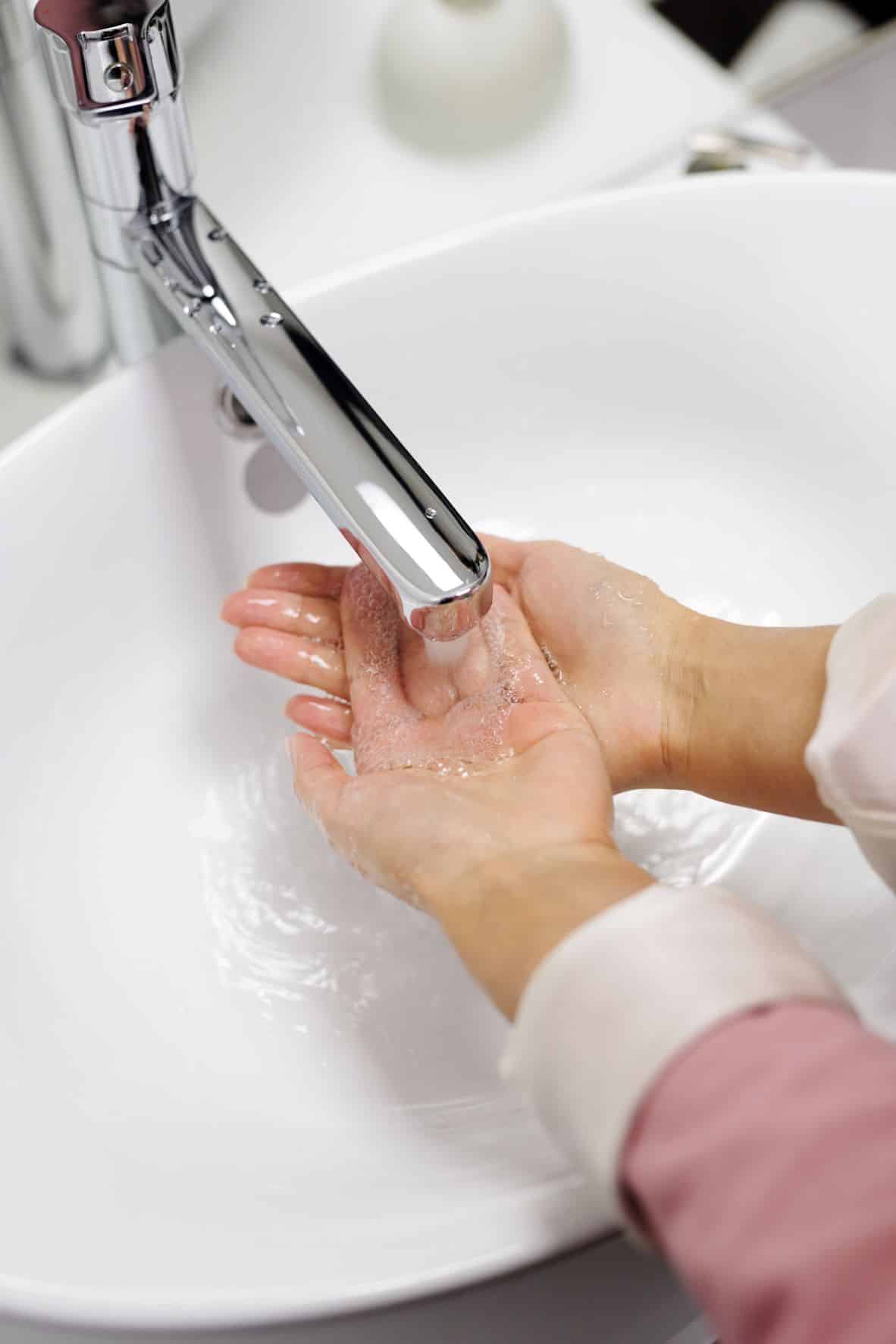 hand washing with faucet